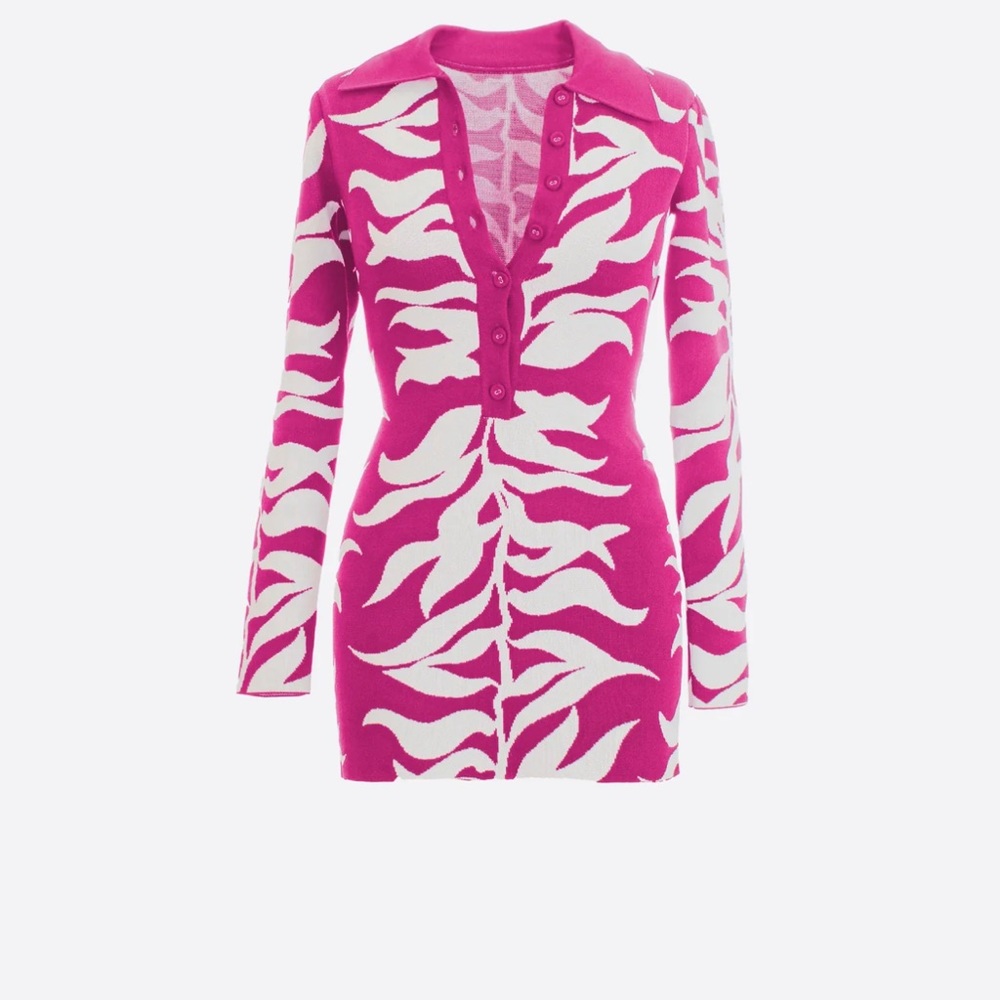 In this collared, buttoned, knit mini you are choosing to make a bold statement. - Picture 1 of 1
